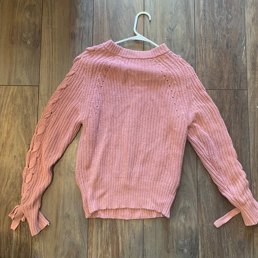 criss-cross design pink sweater